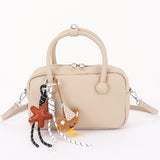 Vegan Leather Bowling Bag with Cute Charm – Top Handle Crossbody